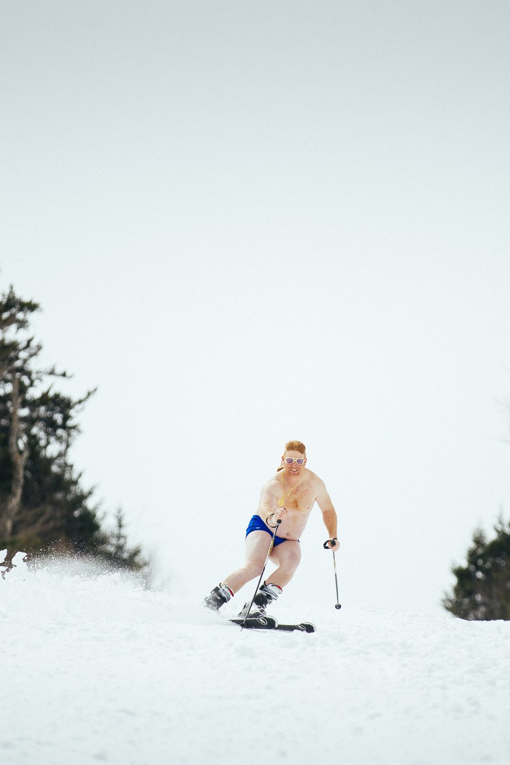 The King ripping down a bright spring slope